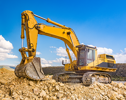 Excavator on rocky terrain